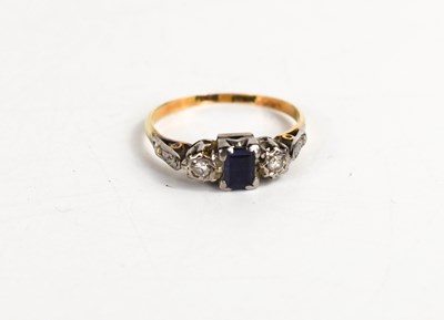 Lot 85 - An 18ct gold sapphire and diamond ring, the...