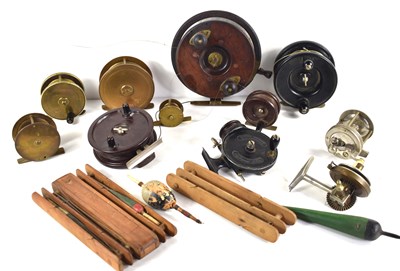 Lot 490 - A group of vintage fishing reels and floats to...