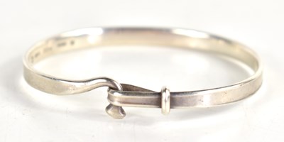 Lot 93 - Georg Jensen. A sterling silver bangle,...