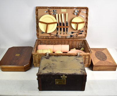 Lot 187 - A vintage Coracle picnic set in a wicker...