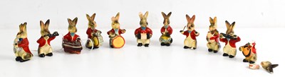 Lot 194 - A group of eleven rabbit figures playing...