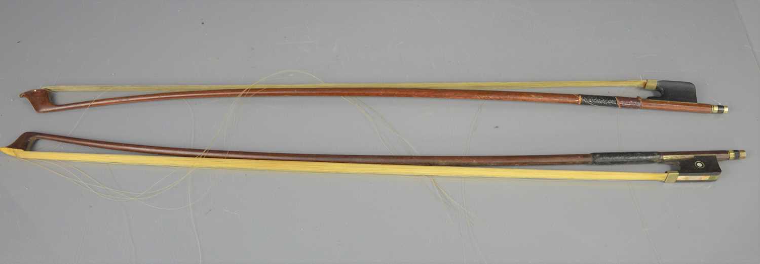 Lot 504 - Two 19th century cello bows with mother of...