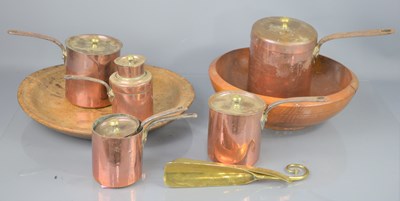 Lot 293 - A set of six tall copper ladle type pans with...