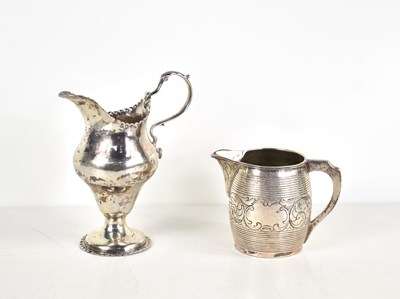 Lot 32 - A George III silver cream jug, embossed with...