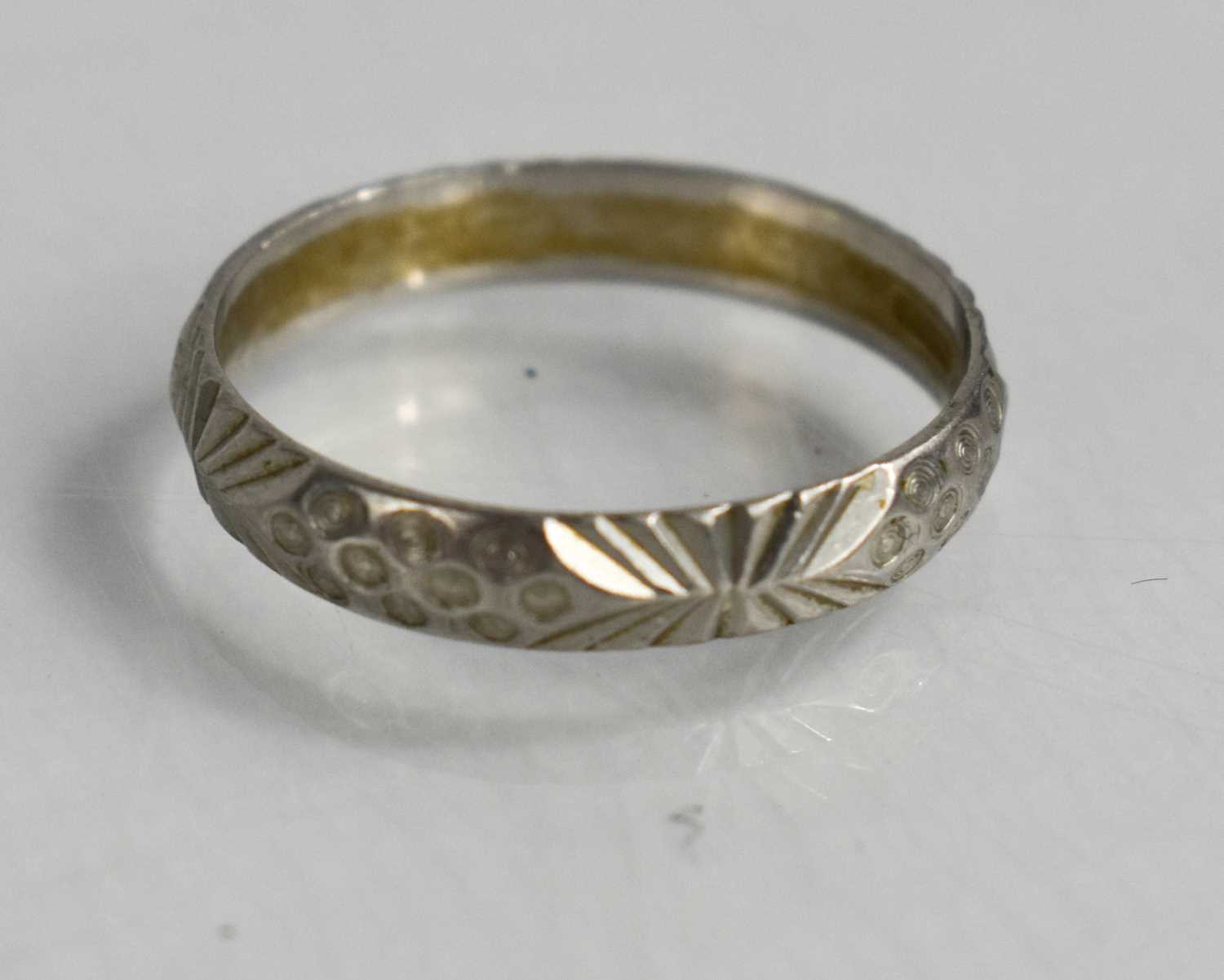 Lot 150 - A platinum wedding band, with Modernist...