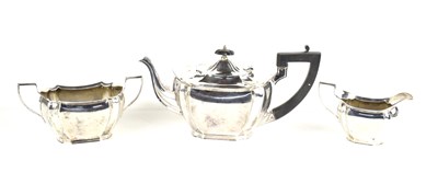 Lot 5 - A silver tea set comprising tea pot with...