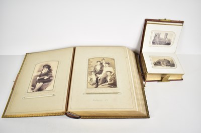 Lot 305 - Two Victorian photograph albums, mainly...