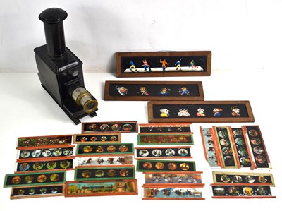 Lot 302 - A vintage magic lantern together with a...