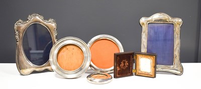 Lot 42 - A selection of silver photograph frames, three...