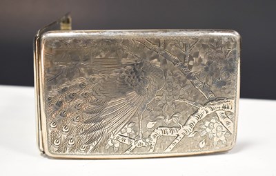 Lot 54 - A silver cigarette case, engraved with...