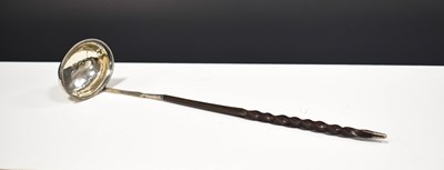 Lot 18 - A Georgian silver and horn ladle, indistinct...