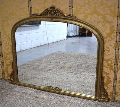 Lot 373 - A 20th century gilt wood overmantle mirror,...