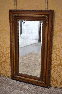 Lot 370 - A 19th century oak and gilt hall mirror, the...