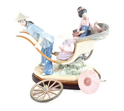 Lot 236 - A large Lladro group of a Geisha riding in a...