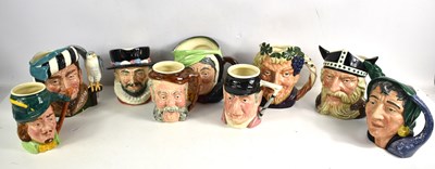 Lot 237 - A selection of nine Royal Doulton character...