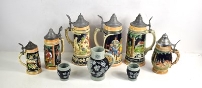 Lot 195 - A group of six German stoneware steins, of...