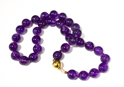 Lot 151 - A 9ct gold and amethyst bead necklace, the...