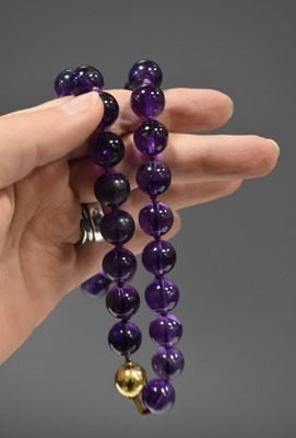 Lot 151 - A 9ct gold and amethyst bead necklace, the...
