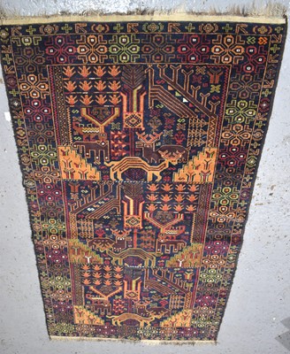 Lot 455 - A Middle Eastern pictorial wool rug, blue...