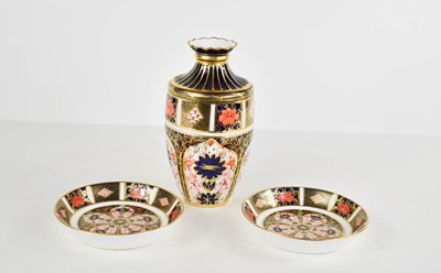 Lot 220 - Three pieces of Royal Crown Derby, in the...