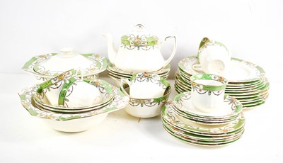 Lot 198 - An Alfred Meakin part tea and dinner service,...