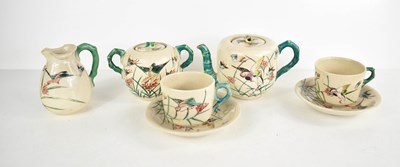 Lot 202 - A vintage stoneware Japanese part tea service,...