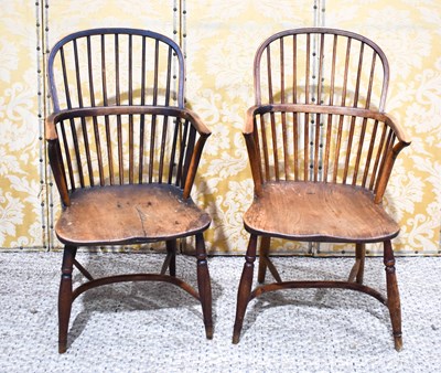 Lot 502 - A near pair of 19th century Windsor armchairs,...