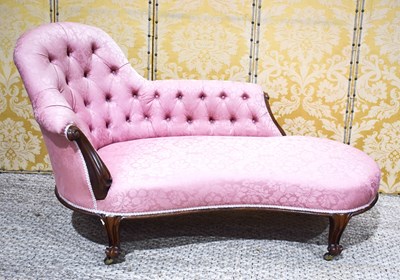 Lot 469 - A Victorian mahogany chaise longue, with pink...