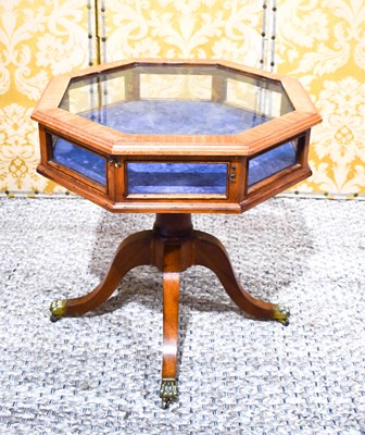 Lot 471 - A mahogany octagonal top display table, the...