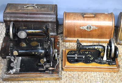 Lot 281 - Three antique Singer sewing machines.