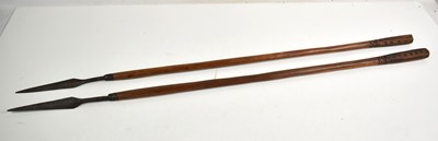 Lot 303 - Two African tribal spears with wooden shafts...