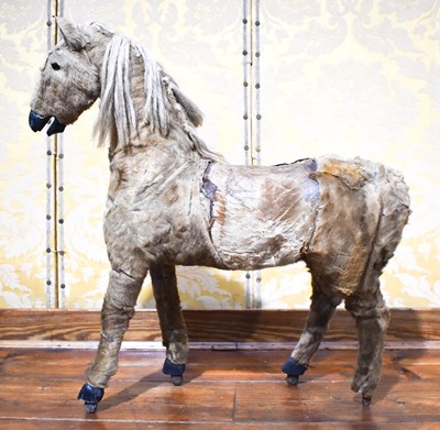 Lot 353 - A Victorian model / toy horse, clad in fur,...