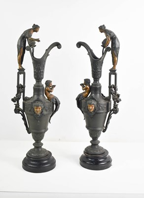 Lot 224 - A pair of Victorian pottery ewers, in matt...