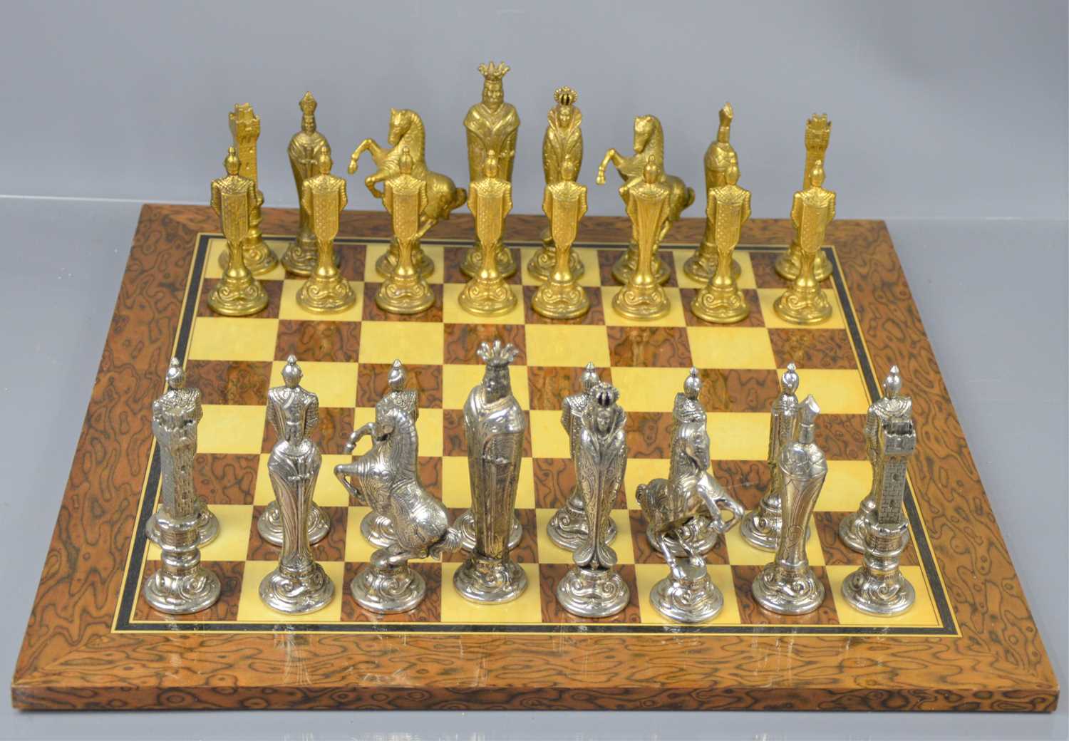 Lot 277 - An Italfama chess set with medieval metal figures