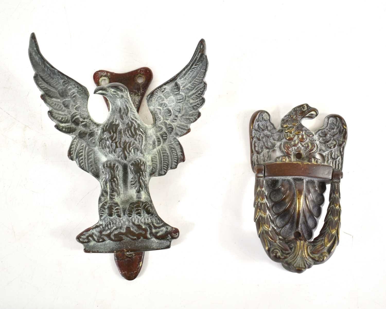 Lot 259 - Two 19th century bronze door knockers in the...