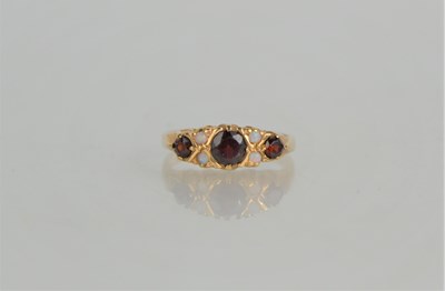 Lot 151 - A 9ct gold, garnet and opal five stone ring,...