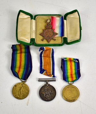 Lot 137 - A group of WWI medals to include a 1914 Star...