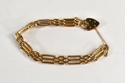 Lot 100 - A 9ct gold gate link bracelet, 12g.