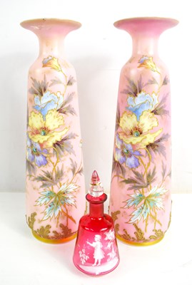 Lot 225 - A pair of pink glass Bohemian vases, decorated...