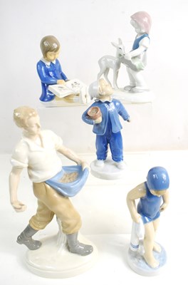 Lot 181 - Two Bing & Grondahl porcelain figurines: boy...