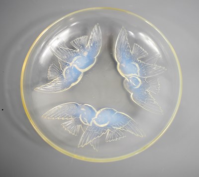 Lot 145 - A Rene Lalique glass bowl, embossed with...