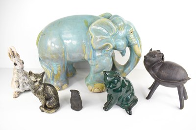 Lot 229 - A large 20th century pottery elephant, with a...