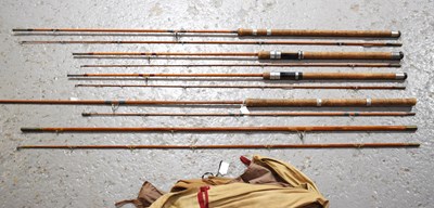 Lot 69 - A selection of split cane fishing rods by...