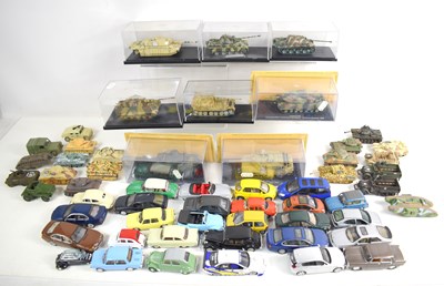 Lot 15 - A group of diecast tanks and military vehicles,...