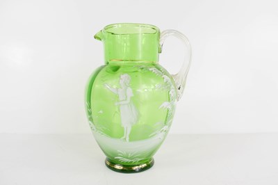 Lot 200 - A Victorian green glass Mary Gregory decorated...