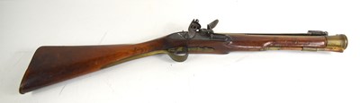 Lot 141 - An 18th century brass barrelled flintlock...