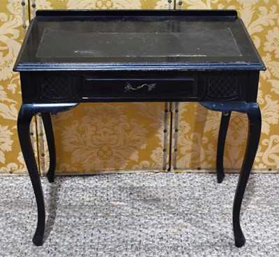 Lot 372 - A Victorian black lacquered desk, with leather...