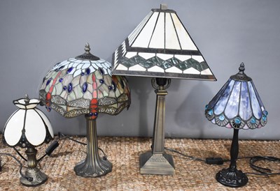 Lot 340 - A selection of Tiffany style glass shade table...