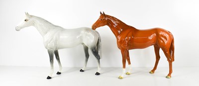 Lot 158 - Two Beswick pottery horses, one dapple grey...