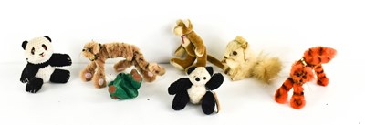 Lot 11 - A selection of miniature toys, to include...